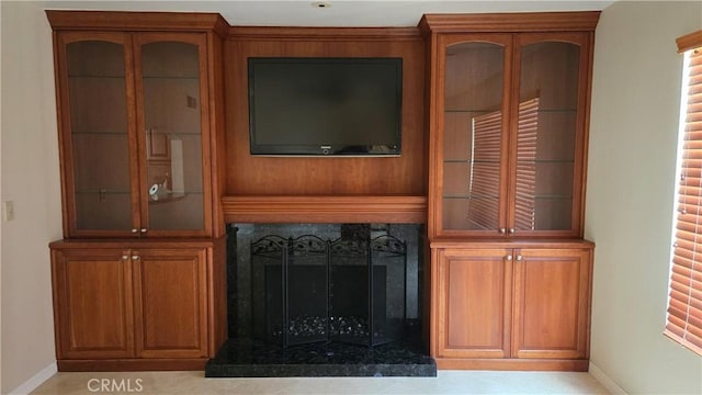 10840 New Salem Pt, San Diego, CA 92126 - living room featuring baseboards and a fireplace with raised hearth
