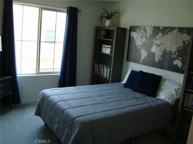 435 N Beechwood Ave, Rialto, CA 92376 - bedroom featuring carpet floors