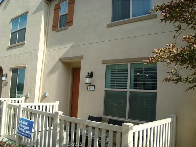 435 N Beechwood Ave, Rialto, CA 92376 - view of exterior entry featuring stucco siding