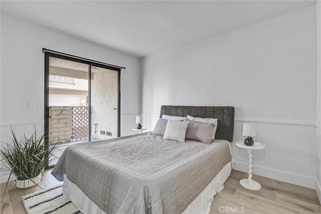 2633 Monte Carlo Dr Unit 41, Santa Ana, CA 92706 - bedroom featuring wood finished floors and wainscoting