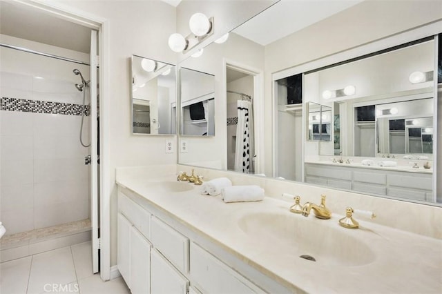 13725 Los Angeles St Unit H, Baldwin Park, CA 91706 - full bathroom with a tile shower, double vanity, and tile patterned floors