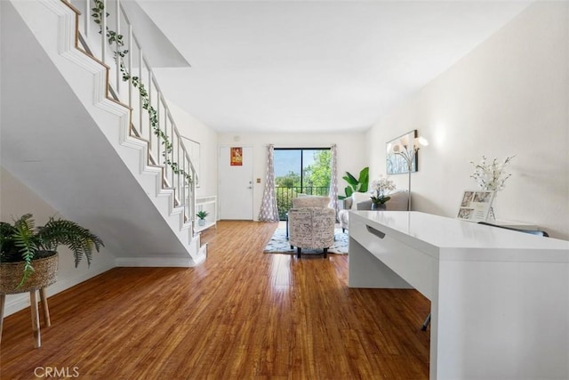 13725 Los Angeles St Unit H, Baldwin Park, CA 91706 - living room with wood finished floors and stairs