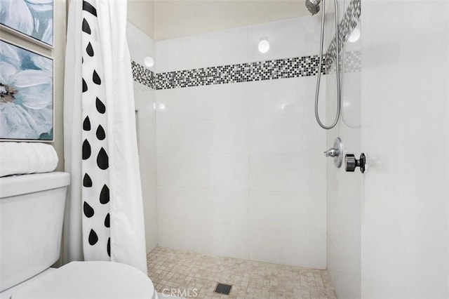 13725 Los Angeles St Unit H, Baldwin Park, CA 91706 - bathroom featuring toilet and tiled shower