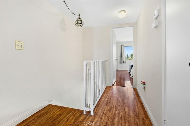 13725 Los Angeles St Unit H, Baldwin Park, CA 91706 - corridor featuring an upstairs landing and wood finished floors