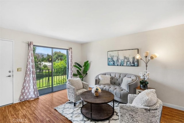 13725 Los Angeles St Unit H, Baldwin Park, CA 91706 - living area with wood finished floors and baseboards