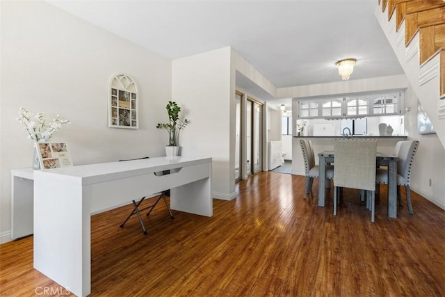 13725 Los Angeles St Unit H, Baldwin Park, CA 91706 - dining area featuring wood finished floors and an office area