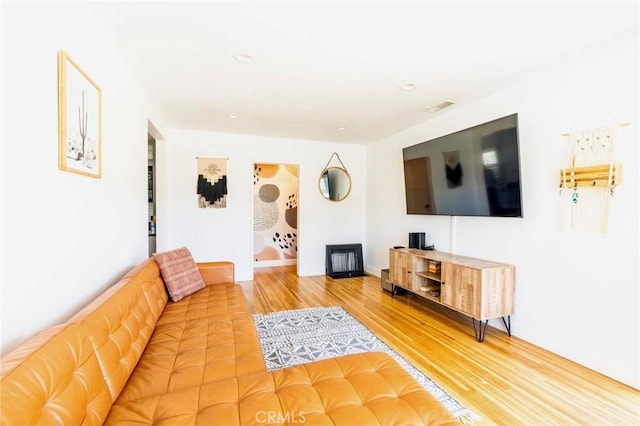 5855 Daneland St, Lakewood, CA 90713 - living area with wood finished floors and recessed lighting