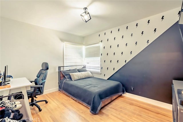 5855 Daneland St, Lakewood, CA 90713 - bedroom with light wood finished floors and an office area