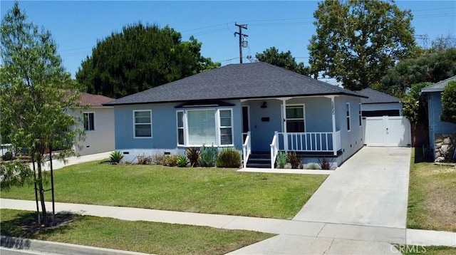 5855 Daneland St, Lakewood, CA 90713 - ranch-style house featuring covered porch, stucco siding, a shingled roof, a front lawn, and crawl space