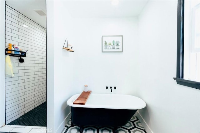 5855 Daneland St, Lakewood, CA 90713 - full bath featuring a freestanding bath, a tile shower, and tile patterned floors