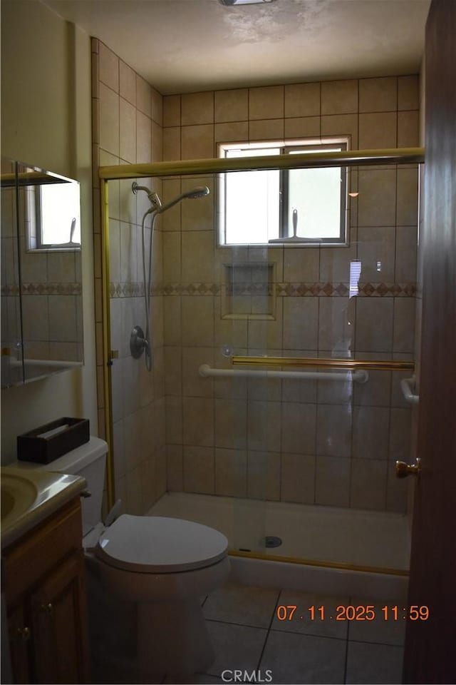 1331 Bothwell Ave, Colton, CA 92324 - full bath with tile patterned flooring, a shower stall, vanity, and plenty of natural light