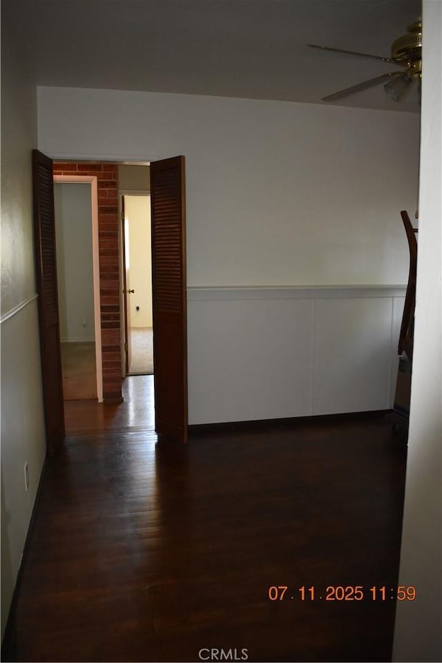 1331 Bothwell Ave, Colton, CA 92324 - empty room featuring ceiling fan and dark wood-type flooring
