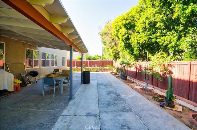 12672 Bellflower Ln, Moreno Valley, CA 92555 - fenced backyard featuring a patio, area for grilling, and outdoor dining space