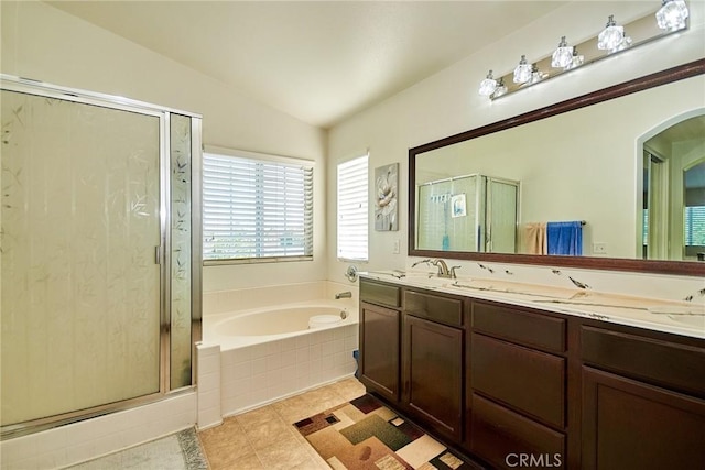 12672 Bellflower Ln, Moreno Valley, CA 92555 - full bath with a stall shower, a bath, double vanity, vaulted ceiling, and tile patterned flooring