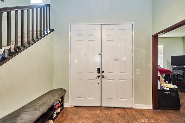 12672 Bellflower Ln, Moreno Valley, CA 92555 - tiled entrance foyer featuring a high ceiling