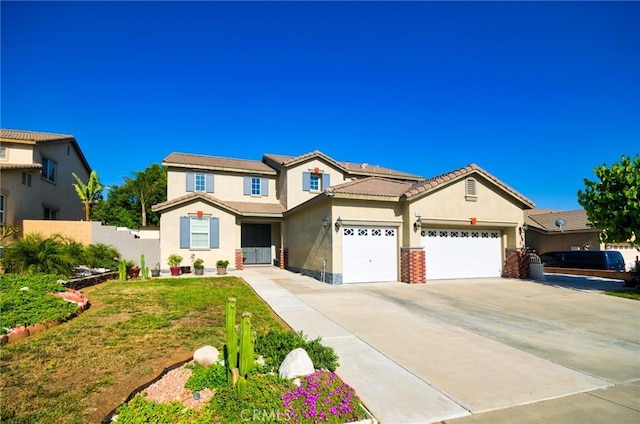 12672 Bellflower Ln, Moreno Valley, CA 92555 - view of front of property with a garage, stucco siding, concrete driveway, and a tile roof