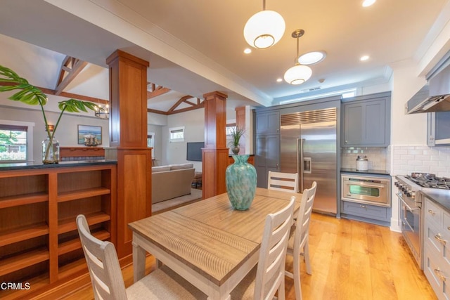 5512 Ranchito Ave, Sherman Oaks, CA 91401 - dining space featuring decorative columns, light wood-style flooring, crown molding, and recessed lighting
