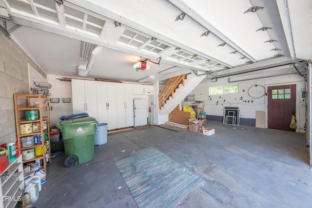 5512 Ranchito Ave, Sherman Oaks, CA 91401 - garage with concrete block wall and a garage door opener