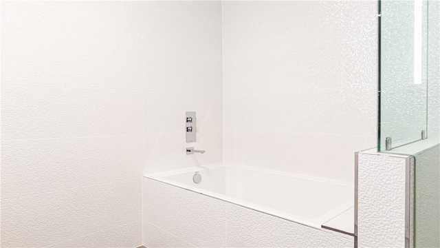 3131 Michelson Dr Unit 901, Irvine, CA 92612 - bathroom featuring a bath and a shower