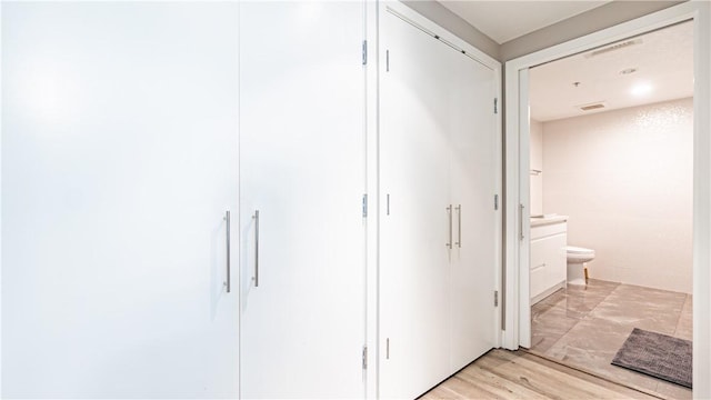 3131 Michelson Dr Unit 901, Irvine, CA 92612 - hall with light wood-style flooring