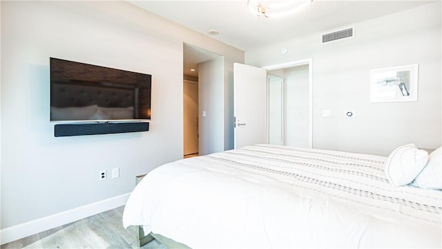 3131 Michelson Dr Unit 901, Irvine, CA 92612 - bedroom with light wood-style floors and baseboards