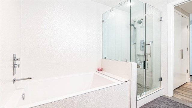 3131 Michelson Dr Unit 901, Irvine, CA 92612 - full bath featuring a shower stall and a garden tub