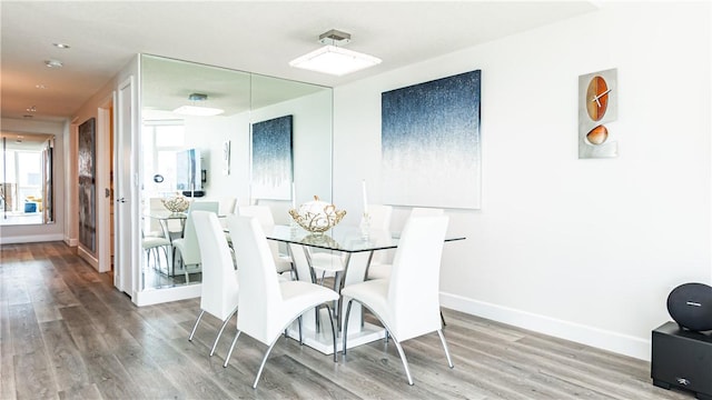 3131 Michelson Dr Unit 901, Irvine, CA 92612 - dining room with wood finished floors and baseboards