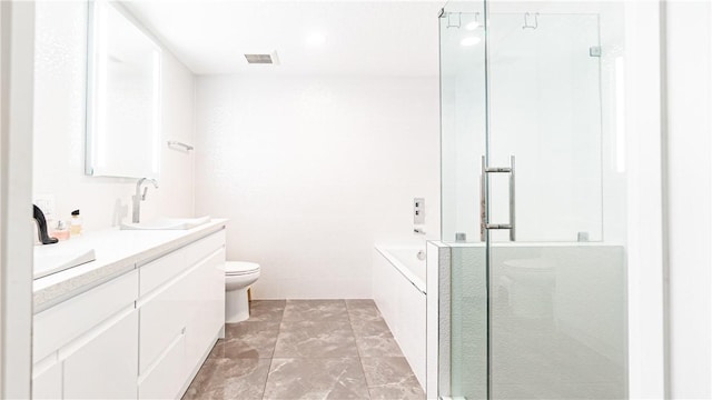 3131 Michelson Dr Unit 901, Irvine, CA 92612 - bathroom featuring vanity, a shower stall, and a garden tub