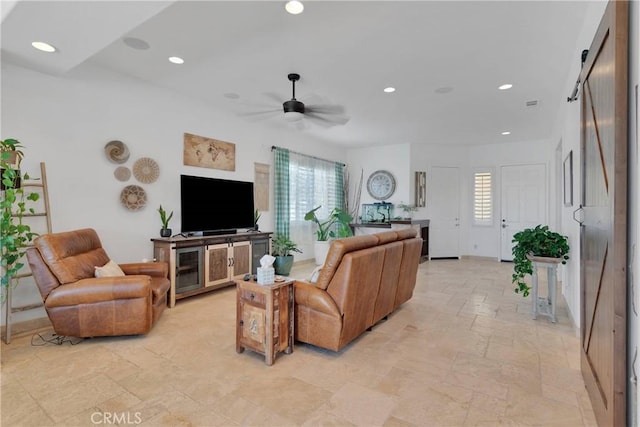 10844 Aster Ln, Apple Valley, CA 92308 - living area with recessed lighting, ceiling fan, a barn door, and stone tile flooring