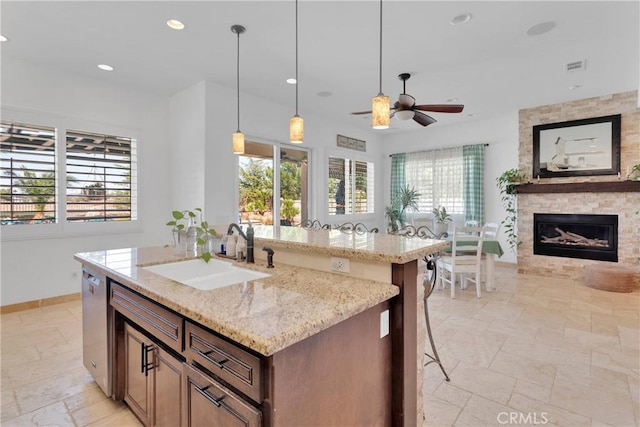 10844 Aster Ln, Apple Valley, CA 92308 - kitchen with recessed lighting, healthy amount of natural light, a ceiling fan, dishwasher, and stone tile flooring