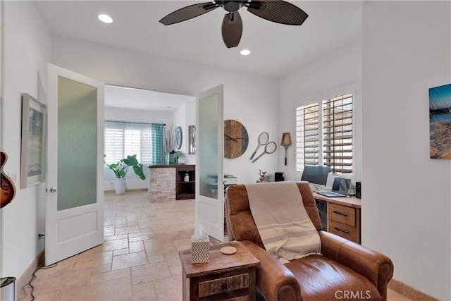 10844 Aster Ln, Apple Valley, CA 92308 - living area with a desk, a ceiling fan, stone tile floors, and recessed lighting
