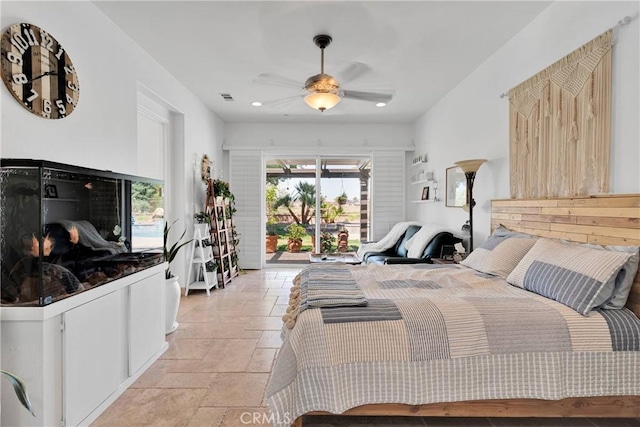 10844 Aster Ln, Apple Valley, CA 92308 - bedroom featuring access to outside, stone tile floors, recessed lighting, and a ceiling fan
