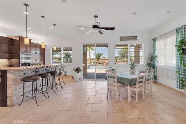 10844 Aster Ln, Apple Valley, CA 92308 - dining space with stone tile flooring, plenty of natural light, ceiling fan, and recessed lighting