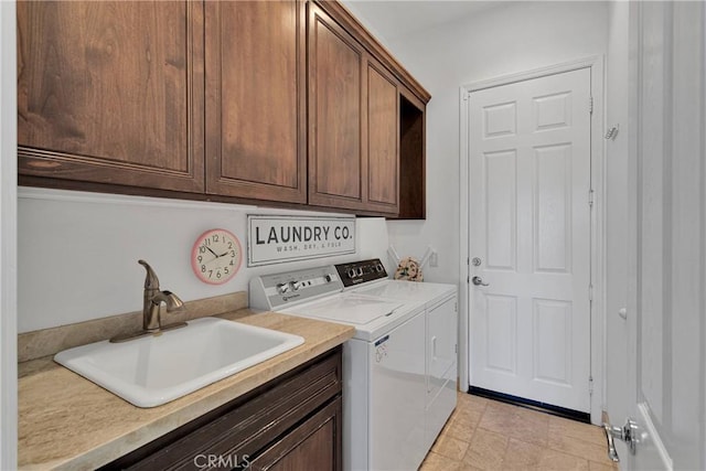 10844 Aster Ln, Apple Valley, CA 92308 - laundry room with washer and clothes dryer and cabinet space