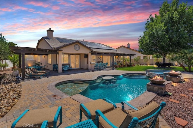 10844 Aster Ln, Apple Valley, CA 92308 - view of swimming pool featuring an outdoor fire pit, a fenced backyard, a patio, and a pool with connected hot tub