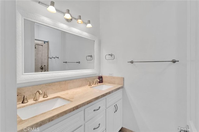 10844 Aster Ln, Apple Valley, CA 92308 - full bathroom featuring double vanity and a shower