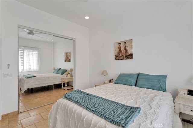 10844 Aster Ln, Apple Valley, CA 92308 - bedroom featuring stone tile floors, a closet, and recessed lighting