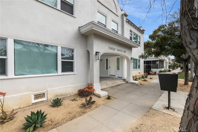 1221 E 1st St, Long Beach, CA 90802 - doorway to property with stucco siding