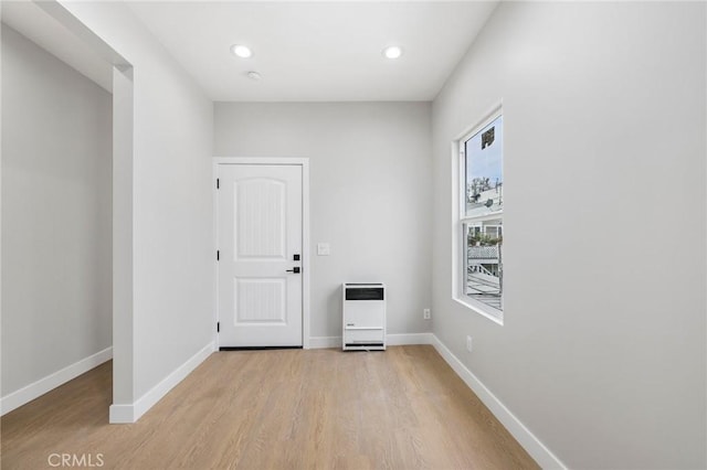 1221 E 1st St, Long Beach, CA 90802 - entrance foyer with heating unit, light wood finished floors, and recessed lighting
