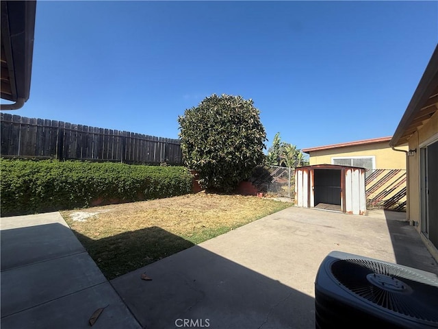 2854 Coronado Ave, San Diego, CA 92154 - fenced backyard featuring a patio and a storage shed