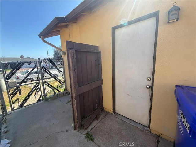 2854 Coronado Ave, San Diego, CA 92154 - entrance to property with stucco siding and a gate