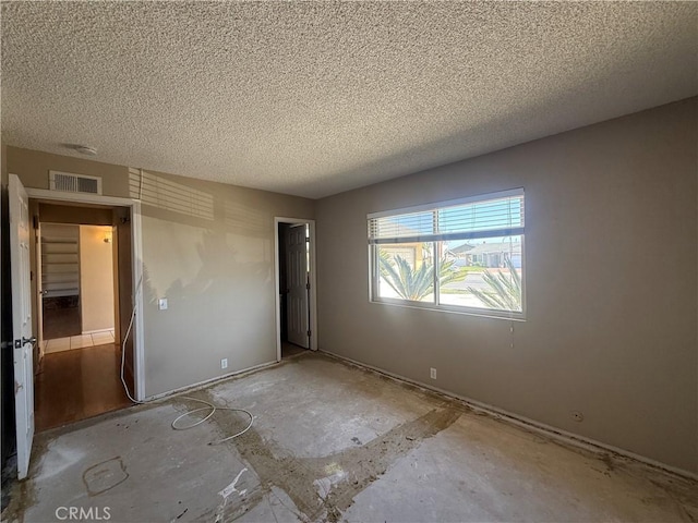 2854 Coronado Ave, San Diego, CA 92154 - unfurnished bedroom with a textured ceiling