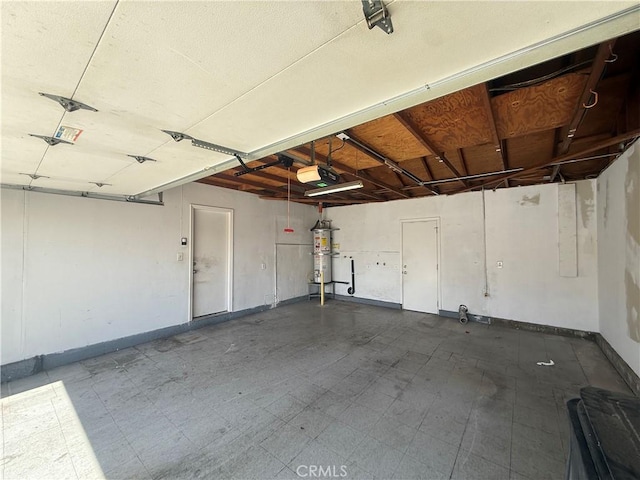 2854 Coronado Ave, San Diego, CA 92154 - garage with baseboards and a garage door opener