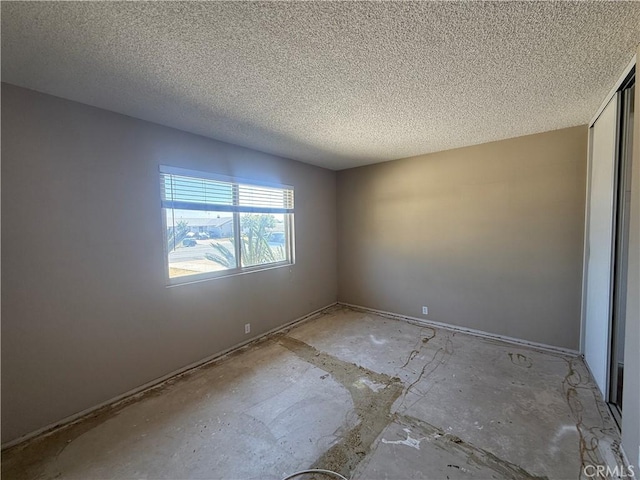 2854 Coronado Ave, San Diego, CA 92154 - spare room featuring a textured ceiling