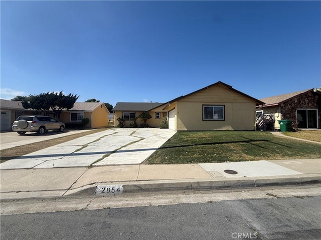 2854 Coronado Ave, San Diego, CA 92154 - ranch-style home with a front yard, concrete driveway, and a garage