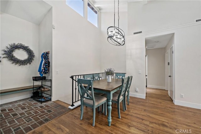 1828 Wintergreen, Escondido, CA 92026 - dining space with a chandelier and a towering ceiling
