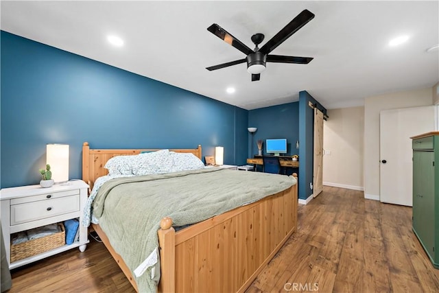 1828 Wintergreen, Escondido, CA 92026 - bedroom with wood finished floors, a ceiling fan, recessed lighting, and a barn door