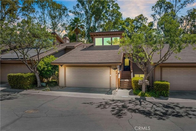 1828 Wintergreen, Escondido, CA 92026 - mid-century inspired home with a tile roof, driveway, and a chimney