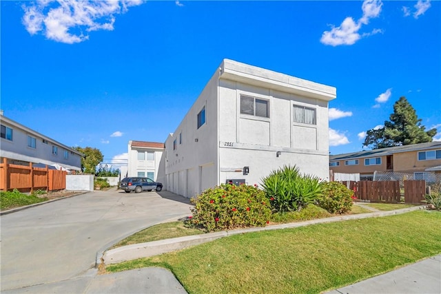7851 Glencoe Dr, Huntington Beach, CA 92647 - view of property exterior featuring stucco siding
