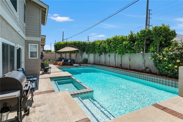 3652 San Joaquin Ave, Los Alamitos, CA 90720 - view of pool with a pool with connected hot tub, area for grilling, a patio, and a fenced backyard